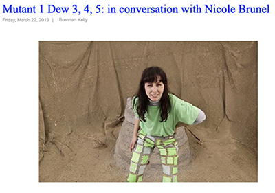 Screenshot from Every worm deserves a mantion video. Character wearing green patched pants and mountain dew shirt in a sand room telling a story while making a funny face at the camera.